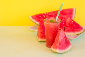 Fresh Color Juices Smoothie Fruits Watermelon Bottles On a yellow background