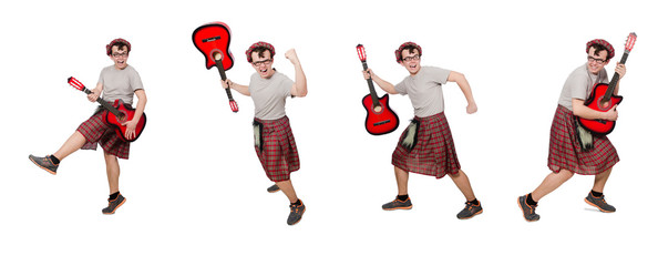 Scotsman playing guitar isolated on white