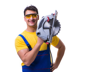 Fototapeta premium Carpenter wearing coveralls with circular saw isolated on white