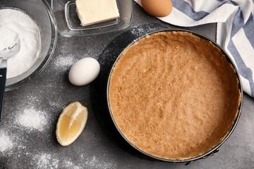 Ingredients for cheesecake on kitchen table