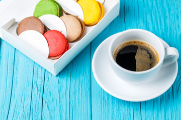 Macaroons with cup of coffee
