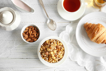 Healthy breakfast with muesli on table
