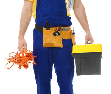 Electrician with bunch of wires and toolbox on white background