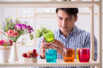 Young handsome man shopping in shop