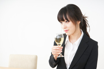 Woman drinking Alcoholics with suit