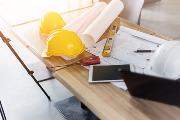 architect and engineer work concept with working stuff on wooden desk
