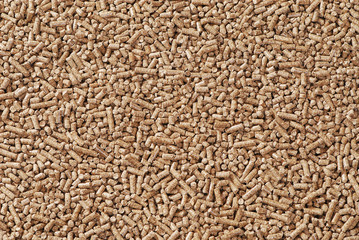 Wood pellets - close-up, background, cheap energy.