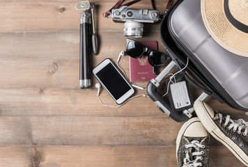 Travel accessories costumes. Passports, luggage, camera, sunglasses, sneaker