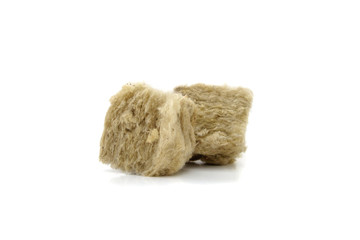 Mineral wool for insulation. The fiberglass is isolated on white.