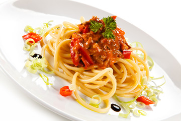 Pasta with bolognese sauce on white background 