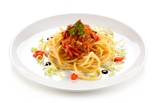 Pasta with bolognese sauce on white background 