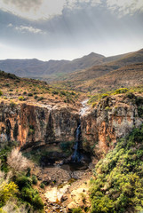 Fototapeta premium Landscape with the agriculture field, canyon of Makhaleng river and waterfall around Malealea in Lesotho