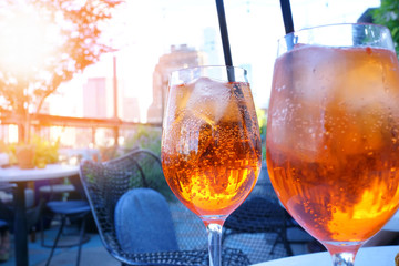 View of cocktail glasses set on rooftop table