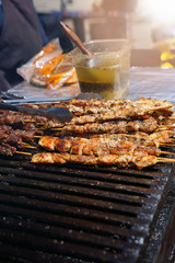 Meat kebabs grilling on barbecue