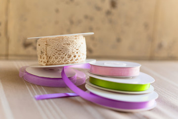 Rolls with pastel color ribbons and lace