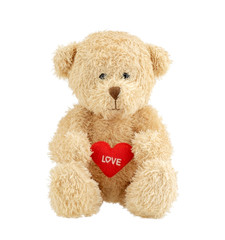 Light brown teddy bear  holding a red heart isolated on white background. Valentine's Day.