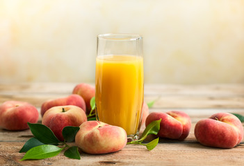 Fresh peaches juice in glass