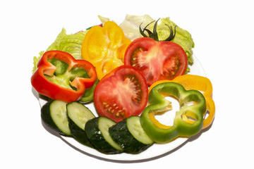 Fresh vegetables on a plate, ingredients for salad