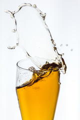 Splashing beer from a glass