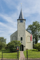 Fototapeta na wymiar Front of church of Feerwerd