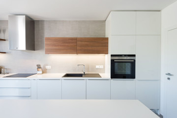 Naklejka na ściany i meble Modern kitchen interior with with built-in appliances