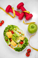 Healthy fitness meal with fresh salad. Diet concept.