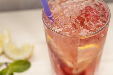 Refreshing fruit lemonade with ice.