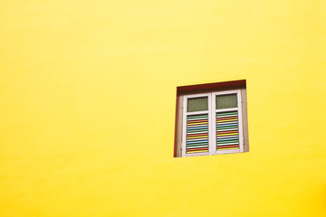 Yellow wall and window, minimalistic wallpaper
