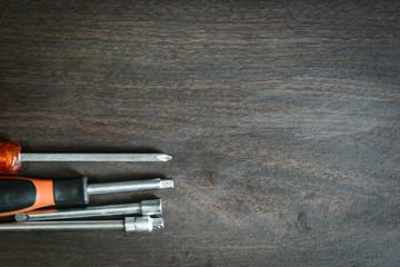 a set of socket screw divers on a wooden background