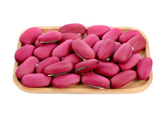 Sword beans in wood plate isolated on white background