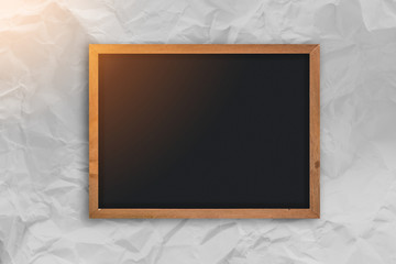 Old folded paper texture.White paper sheet.with blank black chalkboard with free copyspace for your text