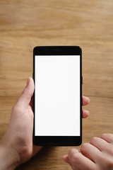 female teen hand using smartphone with blank white screen