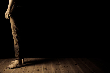 Sepia toned image of teenage boy standing