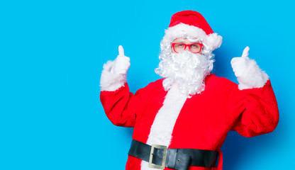 Fototapeta na wymiar Funny Santa Claus have a fun with red eyeglasses