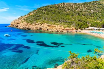 View of Cala Benirras beach with turquoise sea water, Ibiza island, Spain