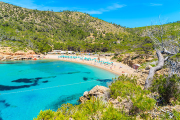 View of Cala Benirras beach with turquoise sea water, Ibiza island, Spain - obrazy, fototapety, plakaty