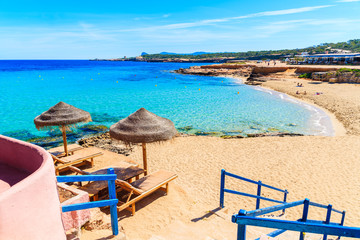 Steps from coastal bar to Cala Comte beach, Ibiza island, Spain