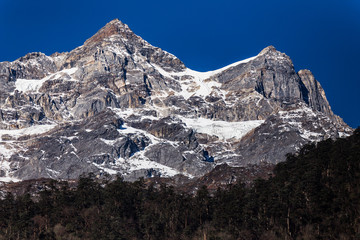 Mountain with little snow on the top sunlight in the morning at Lachen in North Sikkim, India.