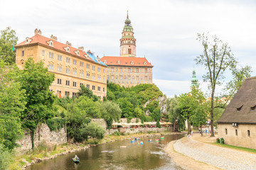 Fototapeta na wymiar Cesky Krumlov Castle with Tower and rafting on Vltava river