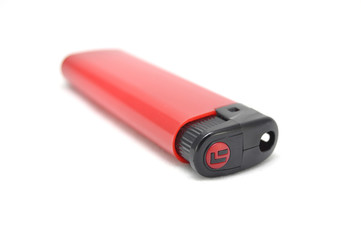 Зажигалка на белом фоне крупным планом 