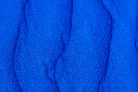 Blue sand texture close up