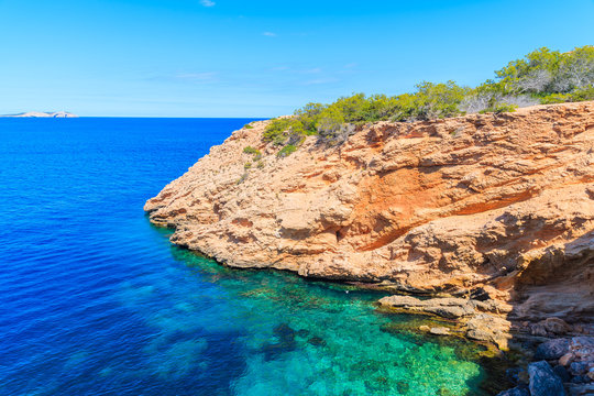Sea cove with turquoise sea water near Punta Galera bay, Ibiza island, Spain