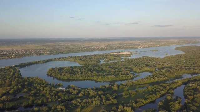 flight of the drone over the fields and rivers