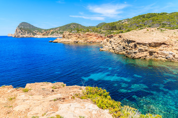 Obraz premium View of Punta Galera bay surrounded by amazing stone formations, Ibiza island, Spain
