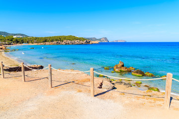 View of Cala Nova beach on sunny summer day, Ibiza island, Spain