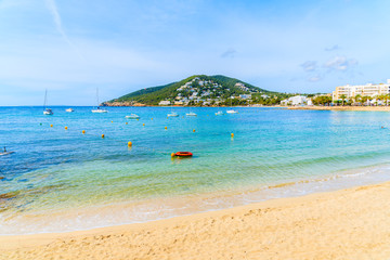 View of beach in Santa Eularia town, Ibiza island, Spain