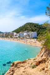 View of Cala San Vicente beach and hotels on shore, Ibiza island, Spain