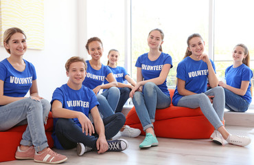 Meeting of young volunteers team indoors