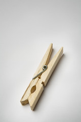 single wooden clothes peg