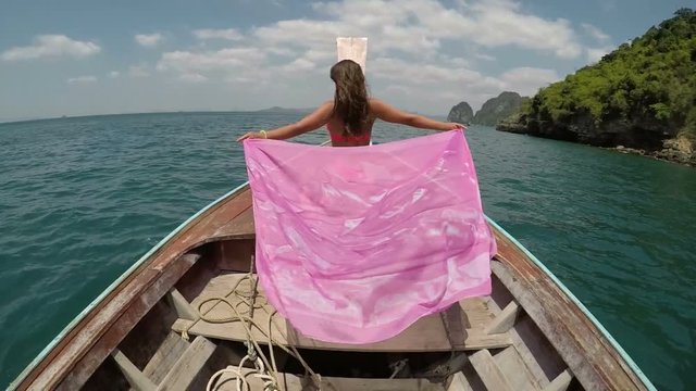 Beautiful Woman Sitting On Thailand Boat Nose Action Camera POV, Raising Hand Back Rear View Of Young Girl Enjoy Wind